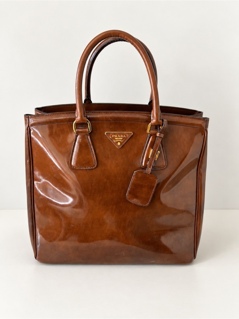 Prada Cognac Patent Leather Satchel with Gold Hardware